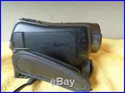 Sony HDR-SR12 120 GB Handycam Camcorder with Docking Station DCRA-C210 + More